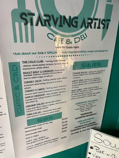 Printed menu page listing Classic & Cold sandwiches, salads and sides